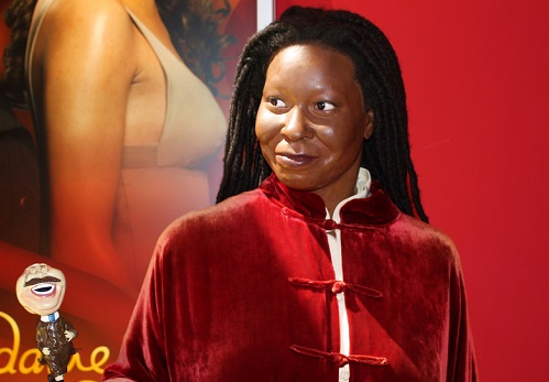 Whoopi Goldberg in a red outfit