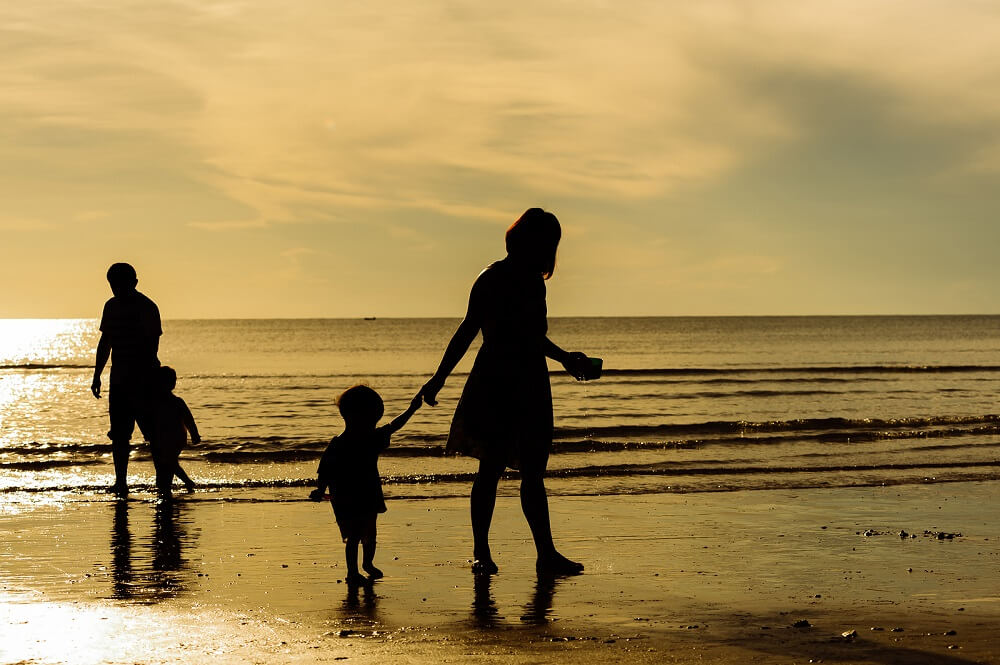 silhouette-boy-mother-walk-on-small-opt